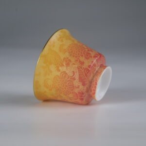 Side view of autumn glow porcelain horseshoe tea cup with floral pattern