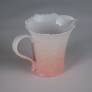 Left side view of cherry blossom pink gradient fair pitcher showing white rim