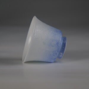 Side view of the East Breaking Dawn gradient blue porcelain mug with a comfortable handle and carved geometric petal patterns