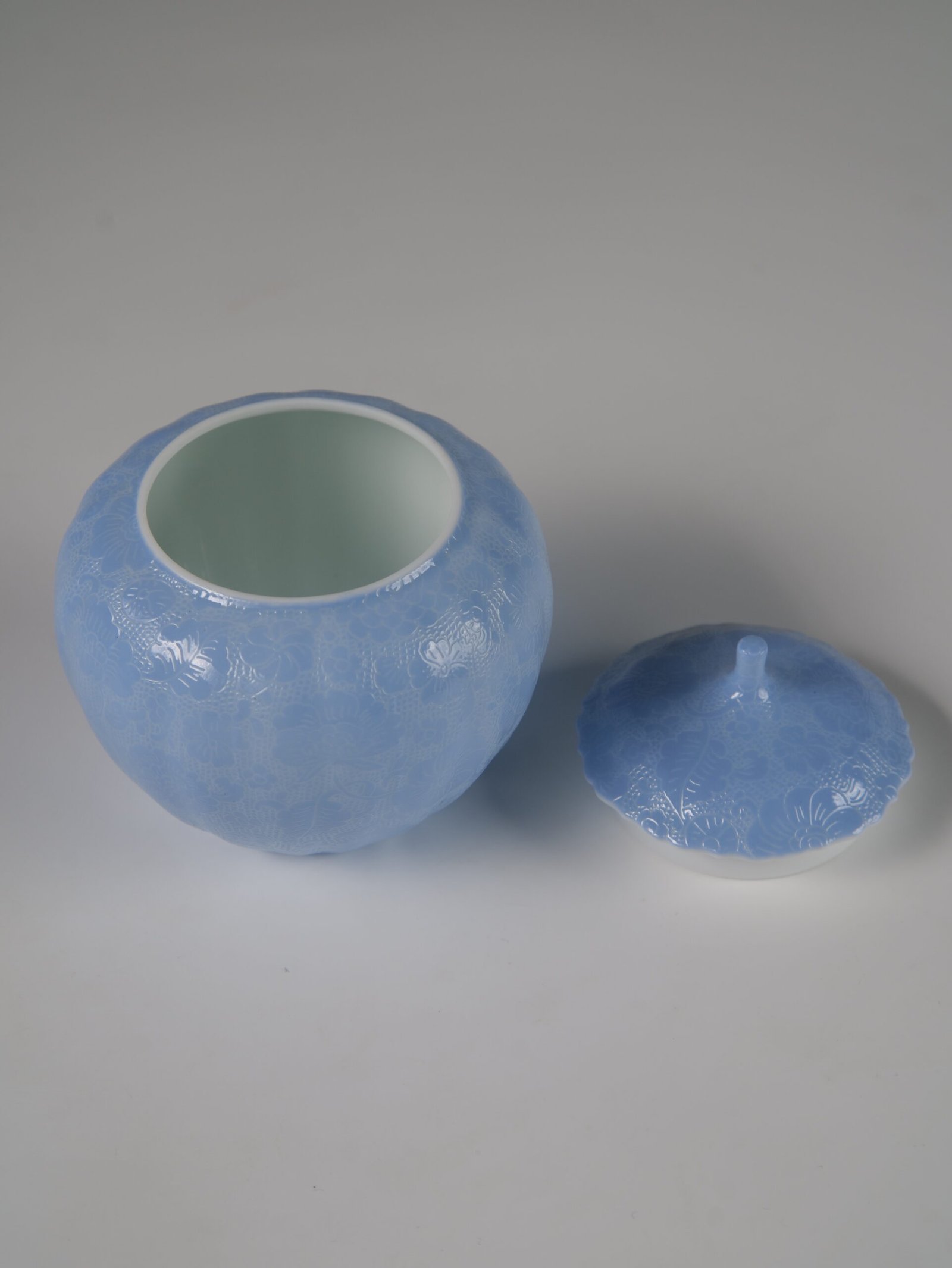 East Breaking Dawn Melon Jar – Interior View High angle view of open east breaking dawn blue melon jar showing white glazed interior
