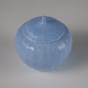 Top view of east breaking dawn blue porcelain melon-shaped jar with lid