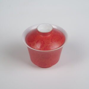 Top-angle view of the Gold-base Vermilion Horseshoe Gaiwan without saucer, showcasing its lid and rim with rich royal vermilion red glaze on gold base and fine engraved Pa Hua daylily patterns