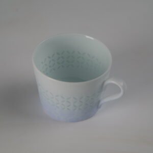 Top view showing interior of light blue gradient porcelain coffee cup