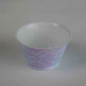 Top-down view of the Misty Lavender Haze Linked-loop porcelain cup featuring a clear white interior and soft purple-to-blue gradient carved floral patterns
