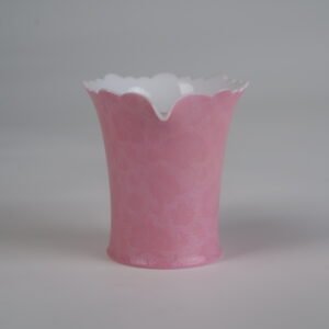 Rear view of peach pink porcelain fair pitcher facing the handle