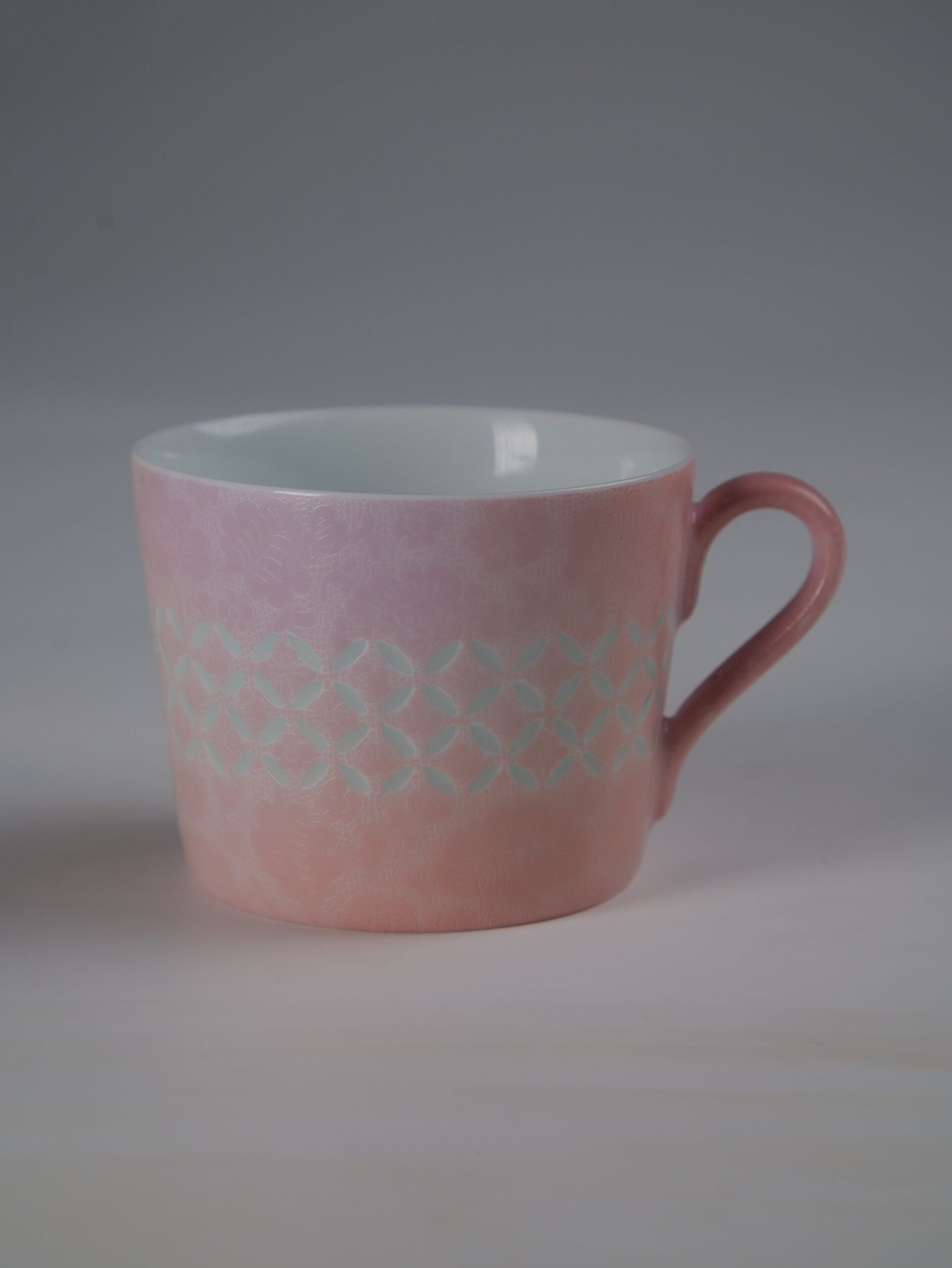 Pink Gradient Coffee Cup – Bright Side View Bright side view of pink gradient porcelain coffee cup