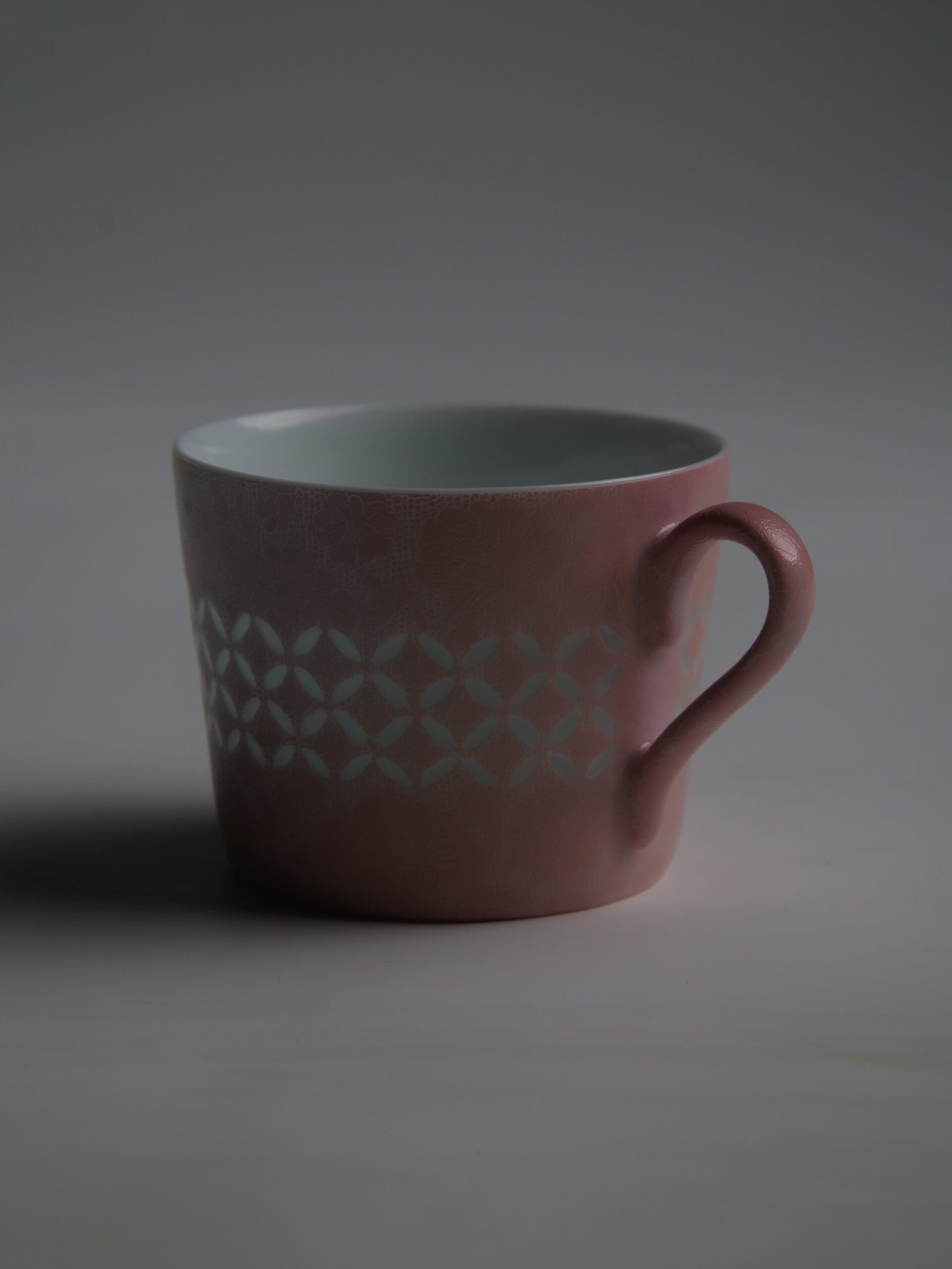 Pink Gradient Coffee Cup – Dark Side View Dark mood side view of pink gradient coffee cup with handle