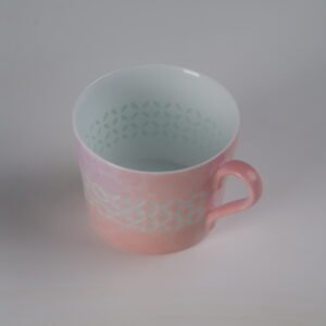Top view showing interior of pink gradient porcelain coffee cup
