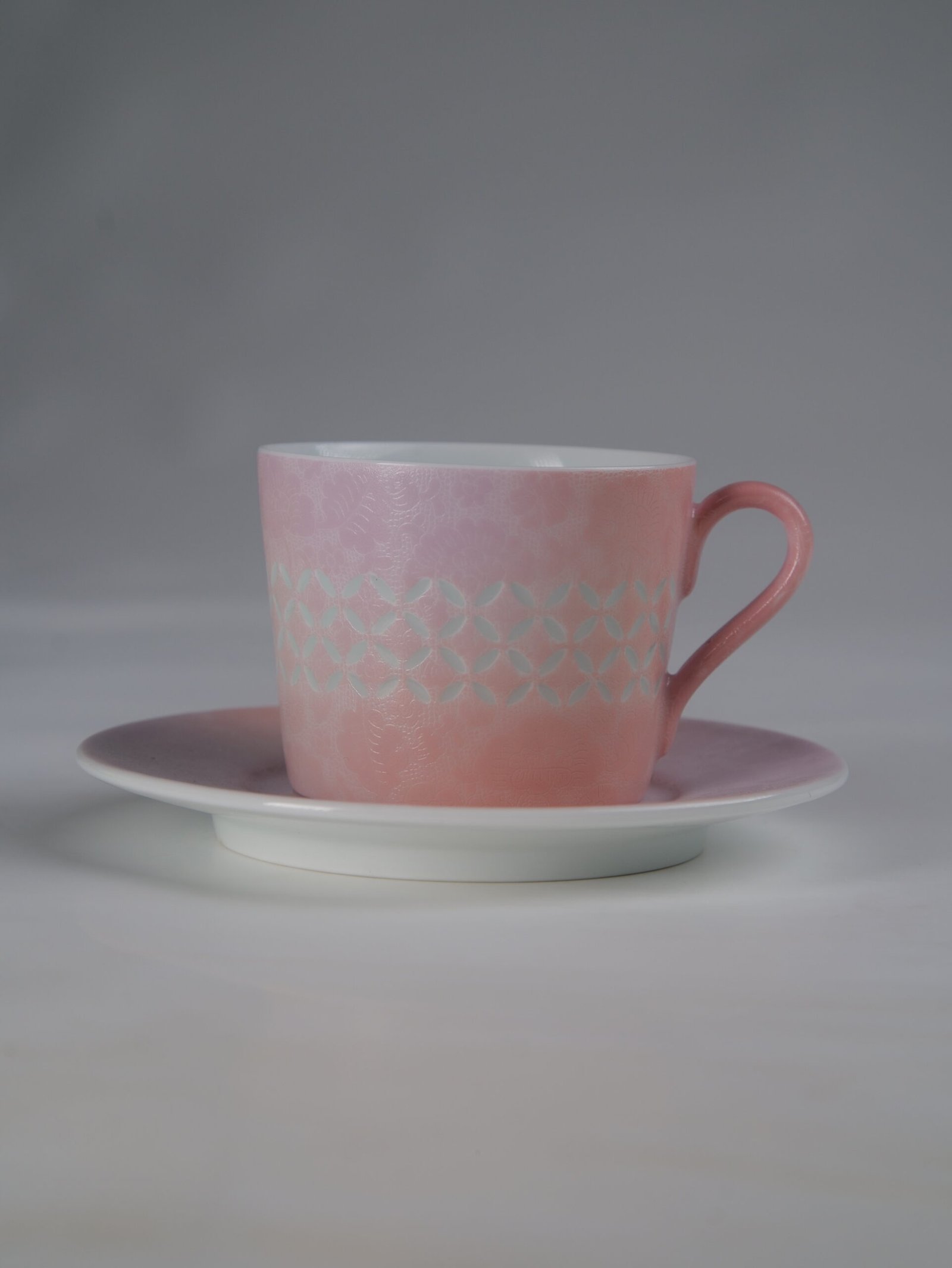 Pink Gradient Coffee Cup - Set View Side view of pink gradient porcelain coffee cup with saucer