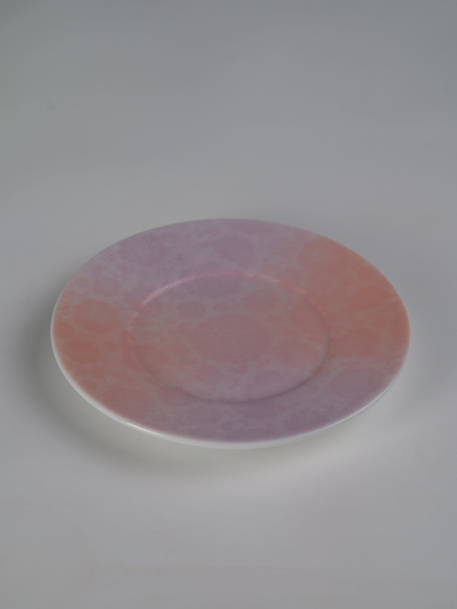 Pink Gradient Coffee Cup – Saucer View Top view of pink gradient porcelain saucer with floral pattern