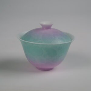 Side view of the Spring Glow Gradient Elegant Charm Gaiwan without saucer, showcasing the soft pink and fresh green gradient glaze on the lid and cup with handcrafted Pa Hua Hundred Flowers floral pattern