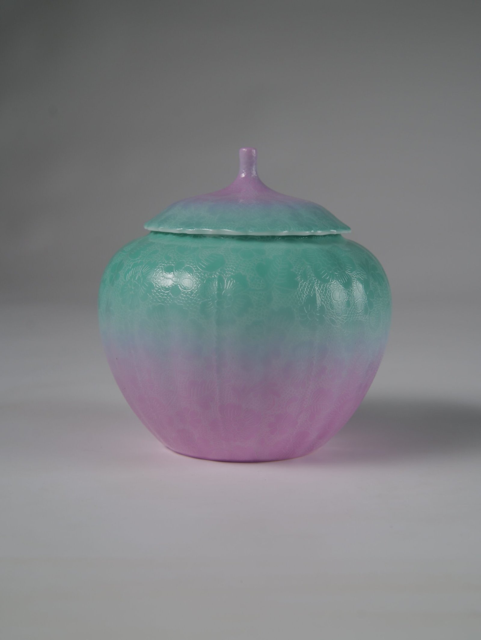 Spring Glow Gradient Melon Jar - Front Profile Eye level front view of spring glow gradient melon-shaped tea jar with hundred flowers pattern