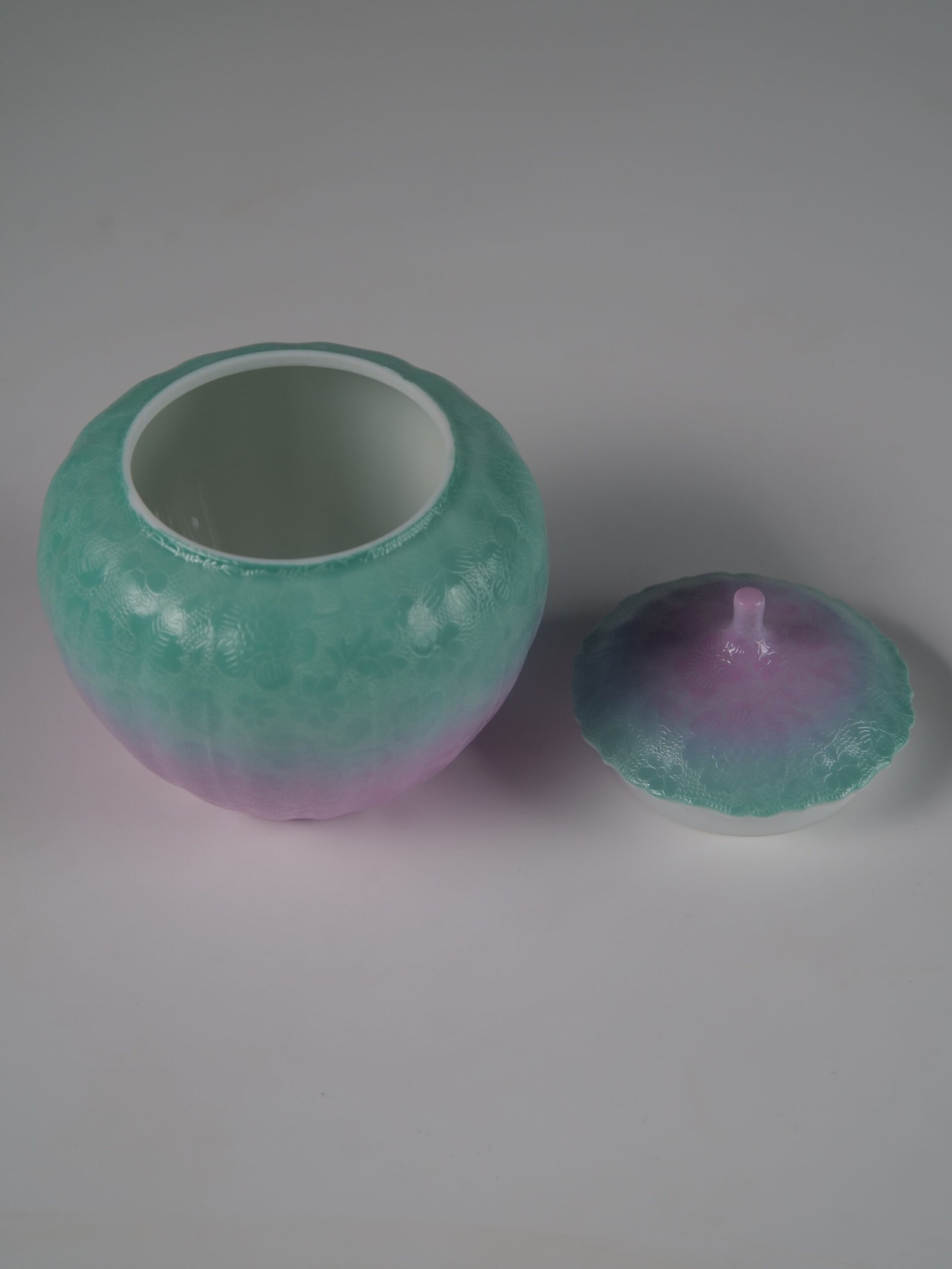 Spring Glow Gradient Melon Jar – Interior View High angle view of open spring glow melon jar showing white glazed interior