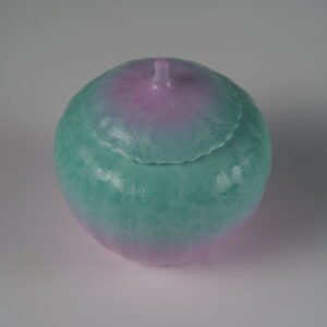 Top view of spring glow gradient porcelain melon-shaped jar with lid