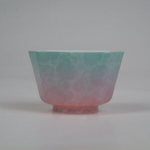 Front view of the Spring Glow Gradient Octagonal Glazed Linglong porcelain cup showcasing its geometric octagonal shape and pastel green-to-pink gradient glaze