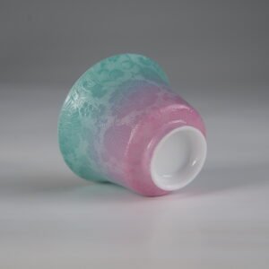Bottom view of spring glow porcelain horseshoe tea cup showing pink base craftsmanship