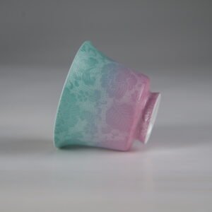 Side view of spring glow porcelain horseshoe cup showing green to pink gradient