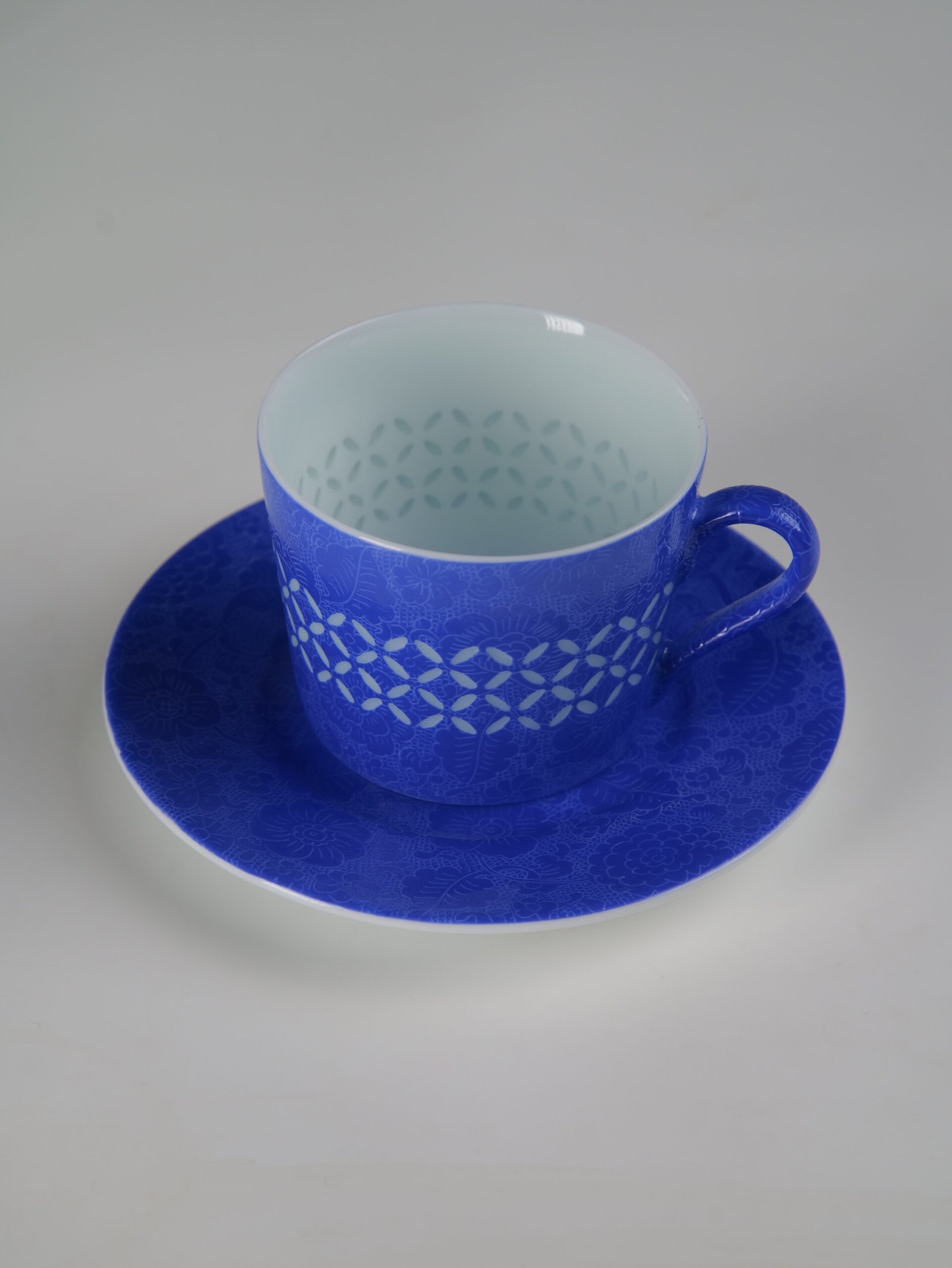 Ultramarine Coffee Cup – Top Angle High angle view of ultramarine porcelain cup on saucer